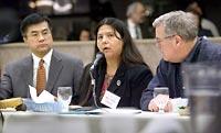 Frances Charles, chairwoman of the Lower Elwha Klallam Tribe, speaks about the project with then Gov. Gary Locke, left, and Transportation Secretary Doug MacDonald at the meeting with tribal officials from around the state in Olympia.