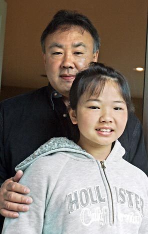 David Fukuhara and daughter Kiki, 9, a student at McGilvra, where diversity has declined.