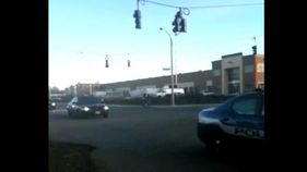 Play video: Raw Video | Police vehicles enter McCord AFB