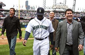 The heart and soul of the Mariners team that saved major-league baseball in Seattle were honored before the home opener at Safeco Field on April 12. From left: Randy Johnson, Ken Griffey Jr., Jay Buhner and Edgar Martinez. 