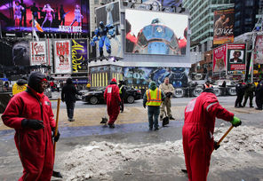 Times Square in New York will be the site of four days of a Super Bow festival leading up to the game on Sunday, but first workers had to clear the snow, ice and slush from the streets. And they might have to do it again Saturday as well.