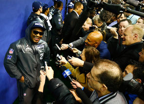 Seahawks running back Marshawn Lynch shares a light moment with reporters during a Media Day interview Tuesday but mostly avoided talking. “I’m just about that action,” he said. “They say, ‘Hut,’ and there’s action. All the unnecessary talk, it don’t do nothing for me.”