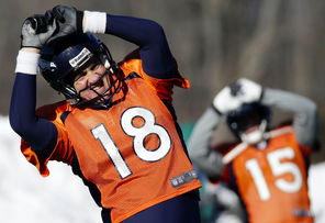 Denver Broncos quarterback Peyton Manning stretches during practice Wednesday in Florham Park, N.J. While his skills have eroded, he still performs like something created to destroy defenses everywhere. 