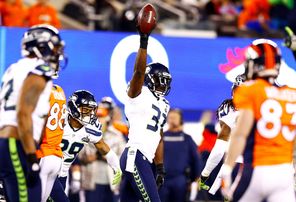 Seahawks safety Kam Chancellor (31) celebrates after intercepting a pass from Denver quarterback Peyton Manning during the first quarter of the Super Bowl.<br/>