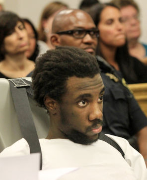  Isaiah Kalebu, in chair restraints, is sentenced for the murder of Teresa Butz and rape of Jennifer Hopper, Butz’s partner, in 2011 in King County Court. 